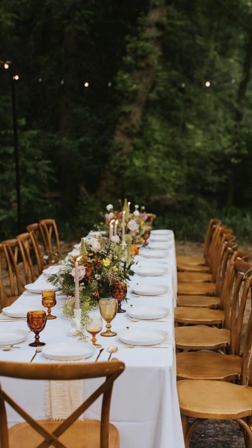 A wedding table under the pines