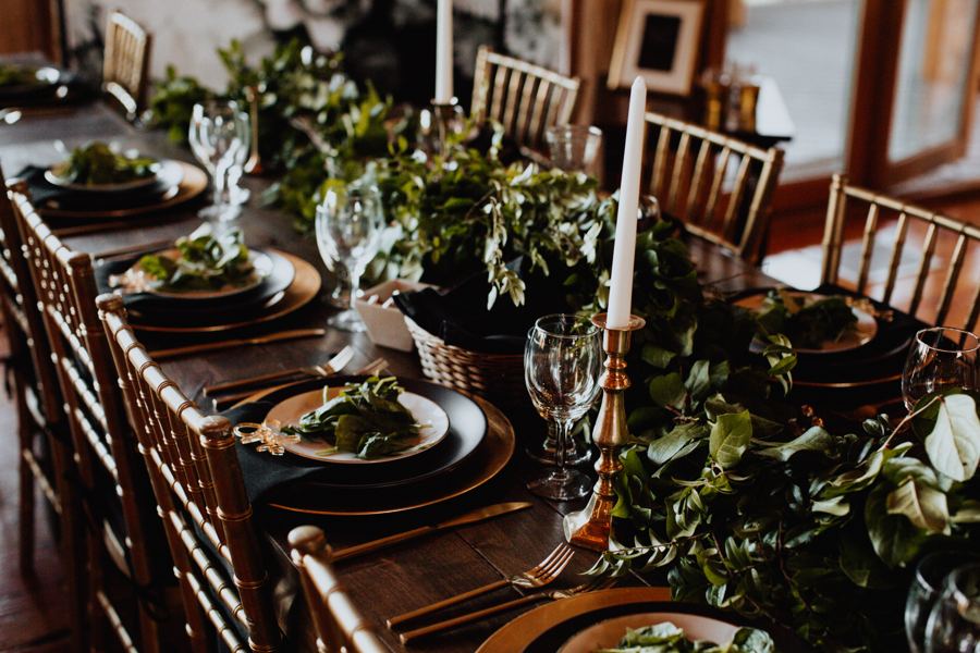 A candlelit corporate dinner table
